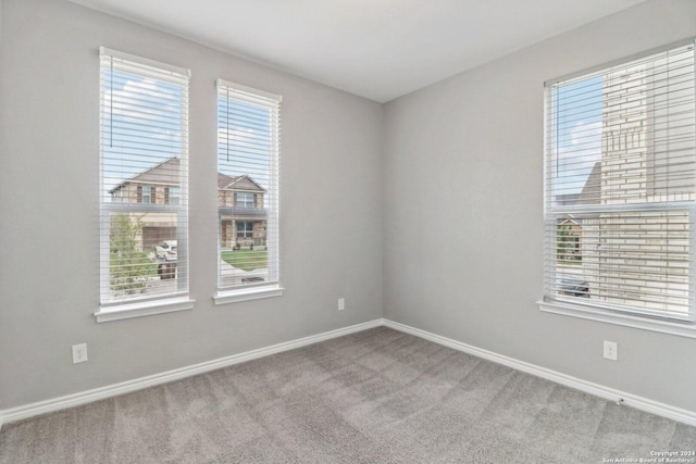 15006 Tethys Way, San Antonio, TX 78245 - carpeted empty room featuring baseboards