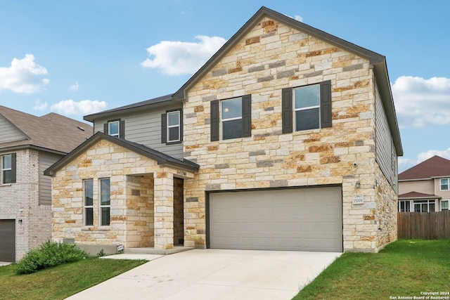15006 Tethys Way, San Antonio, TX 78245 - view of front facade featuring a garage, stone siding, and concrete driveway