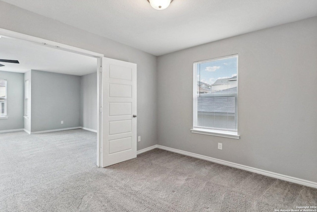 15006 Tethys Way, San Antonio, TX 78245 - carpeted empty room with baseboards