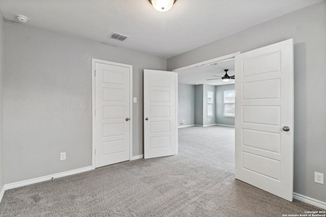 15006 Tethys Way, San Antonio, TX 78245 - unfurnished bedroom with carpet floors and baseboards