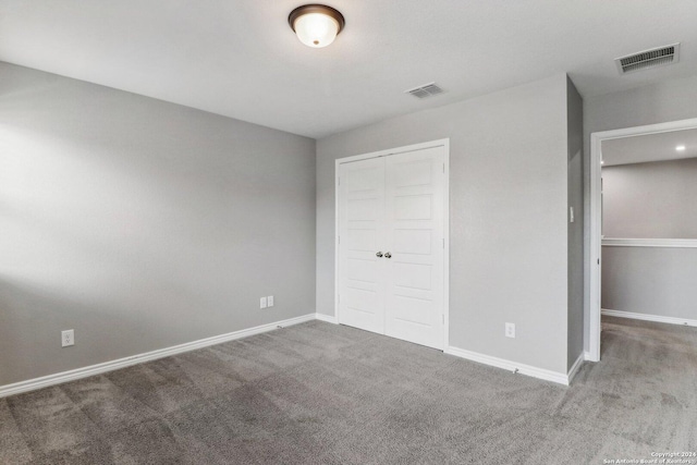 15006 Tethys Way, San Antonio, TX 78245 - unfurnished bedroom featuring carpet floors, a closet, and baseboards