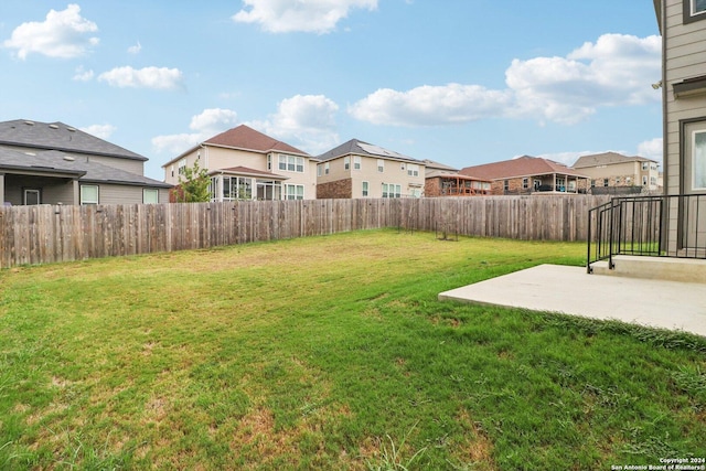 15006 Tethys Way, San Antonio, TX 78245 - view of yard featuring a patio area and a residential view