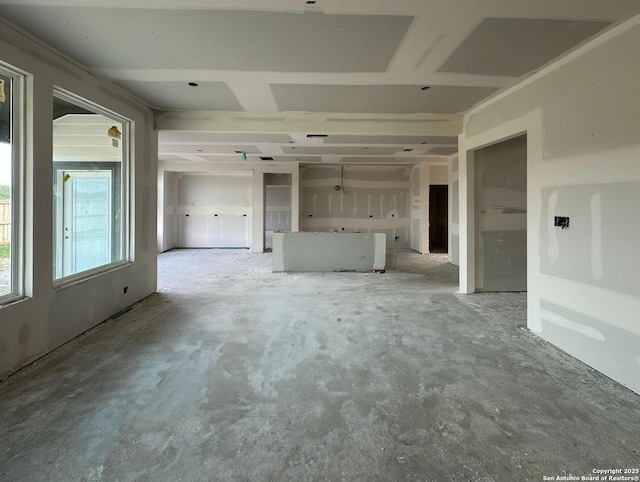 164 Annette Dr, Castroville, TX 78253 - unfurnished living room with concrete flooring