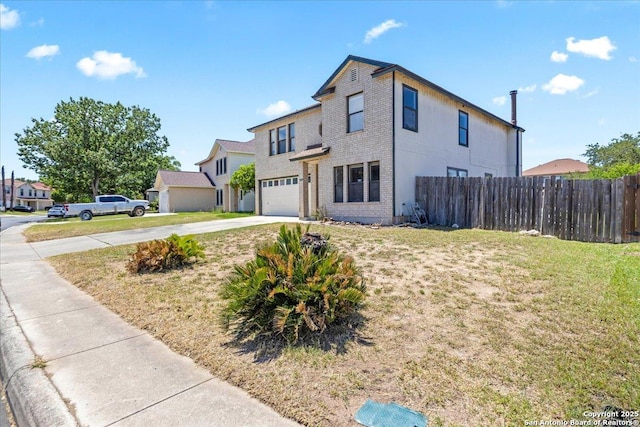 view of front facade featuring concrete driveway, a garage, and brick siding