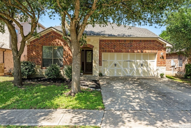 208 Cold Riv, Boerne, TX 78006 - view of front of house with brick siding, a garage, concrete driveway, and roof with shingles