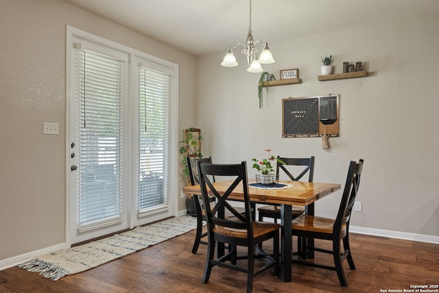 208 Cold Riv, Boerne, TX 78006 - dining area featuring dark wood-style floors, baseboards, and a chandelier