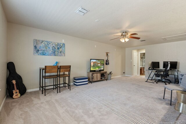 208 Cold Riv, Boerne, TX 78006 - carpeted living room with a ceiling fan, an office area, and baseboards