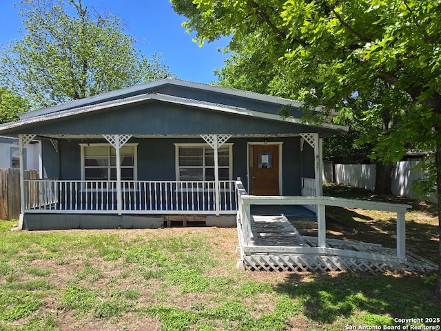 301 Ingram, Ingram, TX 78025 - view of front facade featuring a porch and fence