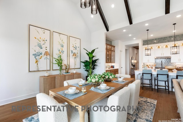 186 Lacey Oak, Castroville, TX 78009 - dining area featuring dark wood-style flooring, beamed ceiling, high vaulted ceiling, recessed lighting, and baseboards