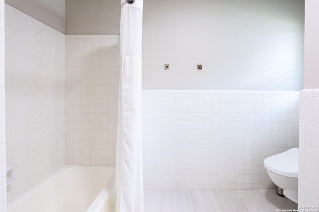 115 Wickford, Castle Hills, TX 78213 - bathroom with shower / bath combo with shower curtain, toilet, tile patterned flooring, and tile walls