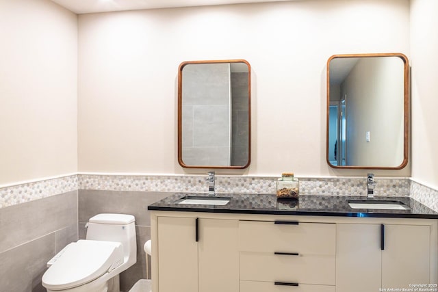 115 Wickford, Castle Hills, TX 78213 - full bath featuring wainscoting, toilet, double vanity, and tile walls