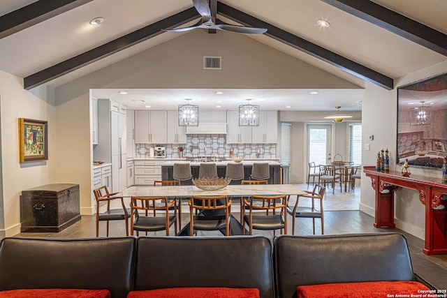 115 Wickford, Castle Hills, TX 78213 - dining space featuring recessed lighting, ceiling fan, baseboards, wood finished floors, and a chandelier