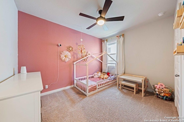 bedroom featuring carpet flooring, ceiling fan, and baseboards