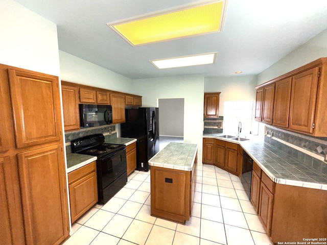 10511 Pemspice, San Antonio, TX 78240 - kitchen with black appliances, a sink, a center island, backsplash, and brown cabinetry