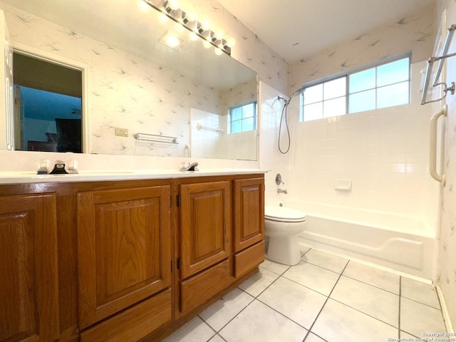 10511 Pemspice, San Antonio, TX 78240 - full bathroom featuring tile patterned floors, wallpapered walls, washtub / shower combination, double vanity, and toilet