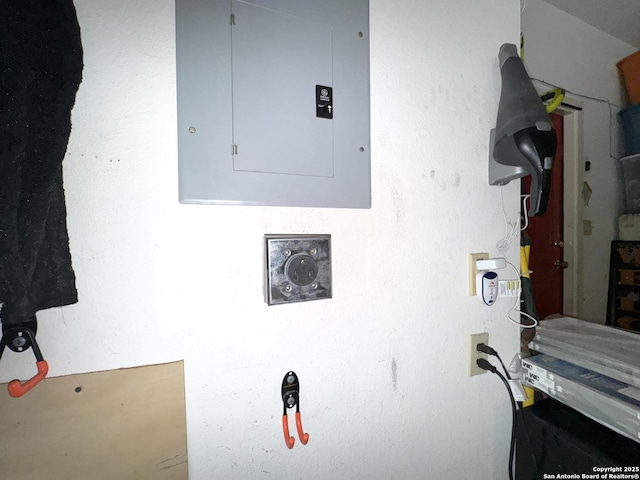 10511 Pemspice, San Antonio, TX 78240 - washroom featuring electric panel and hookup for a washing machine