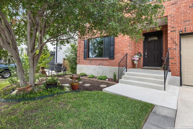 7705 Wood Blf, San Antonio, TX 78240 - doorway to property with brick siding and a lawn