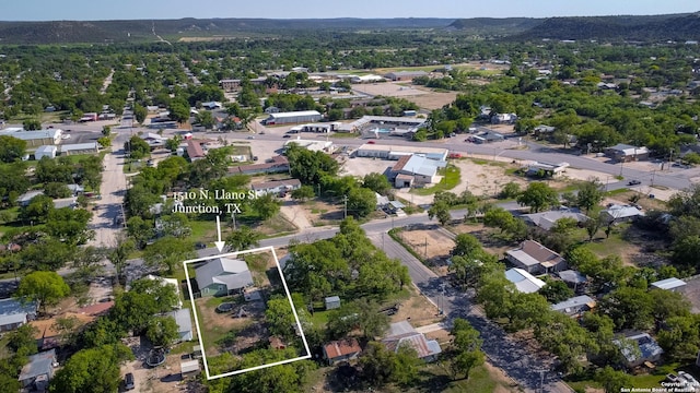 aerial overview of property's location featuring property boundaries highlighted and nearby suburban area
