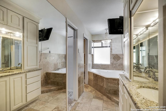 full bath featuring a garden tub and two vanities