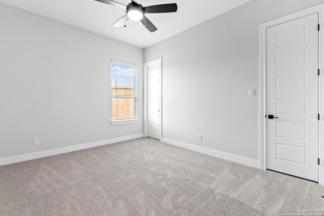 223 Azalea Aly, Castroville, TX 78009 - spare room with ceiling fan, light carpet, and baseboards