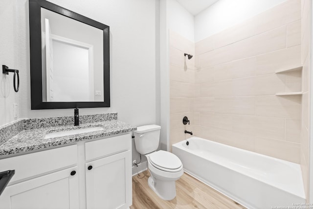 305 Lawrence Dr, Castroville, TX 78009 - full bath with wood finished floors, toilet, vanity, and shower / bath combination