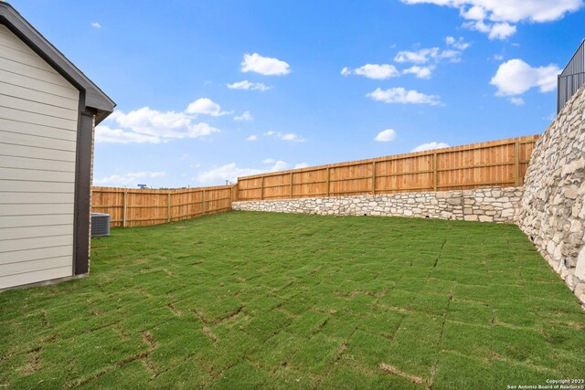 305 Lawrence Dr, Castroville, TX 78009 - view of yard with central AC unit