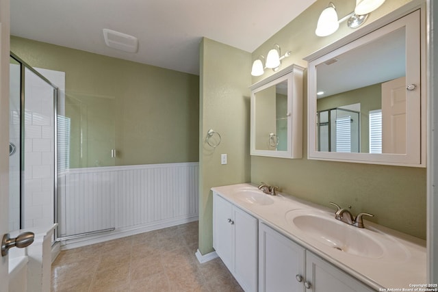 3738 Sumantra, San Antonio, TX 78261 - full bath with a stall shower, double vanity, and tile patterned flooring