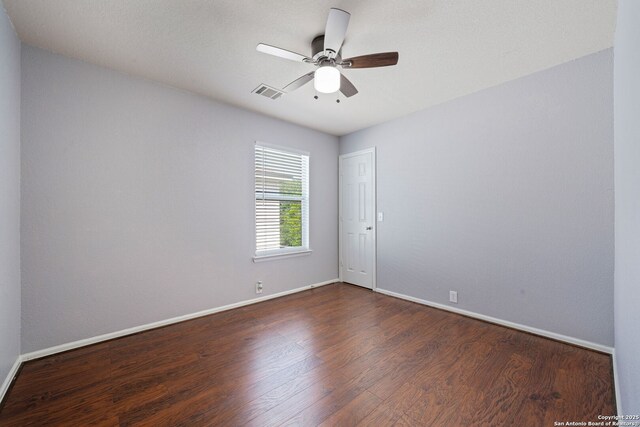 3738 Sumantra, San Antonio, TX 78261 - empty room with dark wood-style flooring, baseboards, and ceiling fan