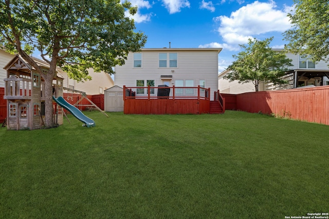 3738 Sumantra, San Antonio, TX 78261 - rear view of house featuring a shed, a playground, a wooden deck, and an outbuilding