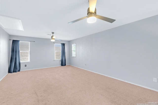 13410 Canyon Mdws, San Antonio, TX 78254 - empty room featuring baseboards, light colored carpet, and a ceiling fan