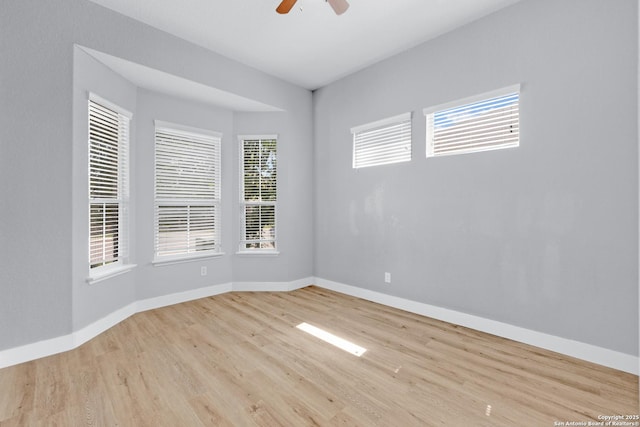 13410 Canyon Mdws, San Antonio, TX 78254 - spare room featuring wood finished floors, baseboards, and a ceiling fan