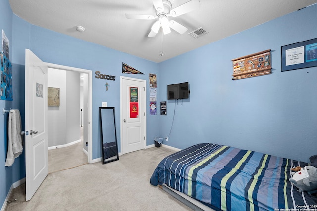 22841 San Saba Blf, San Antonio, TX 78258 - bedroom featuring carpet floors, baseboards, and ceiling fan