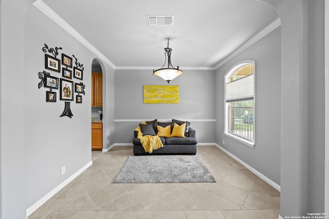 22841 San Saba Blf, San Antonio, TX 78258 - living area featuring arched walkways, ornamental molding, light tile patterned flooring, and baseboards