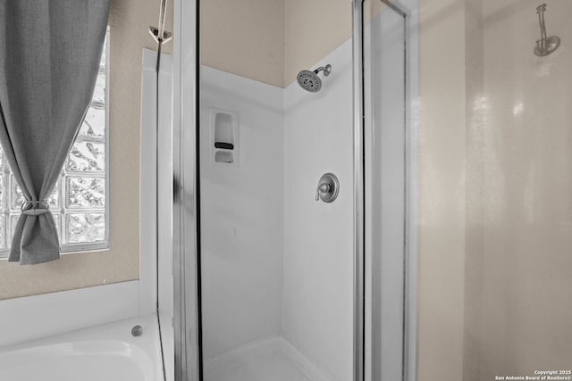 22841 San Saba Blf, San Antonio, TX 78258 - full bath featuring a stall shower and a bath