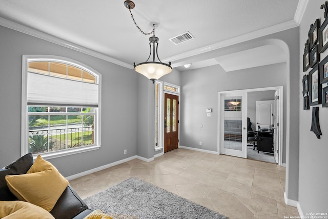 22841 San Saba Blf, San Antonio, TX 78258 - entryway with crown molding, baseboards, and light tile patterned floors
