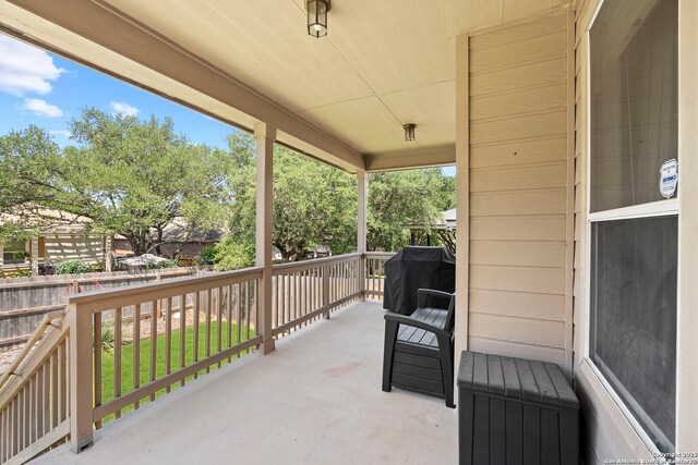 22841 San Saba Blf, San Antonio, TX 78258 - view of patio / terrace featuring a grill, fence, and a porch
