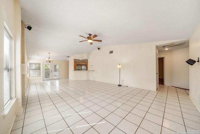 8255 Misty Willow, San Antonio, TX 78250 - spare room with ceiling fan, a chandelier, light tile patterned flooring, and vaulted ceiling