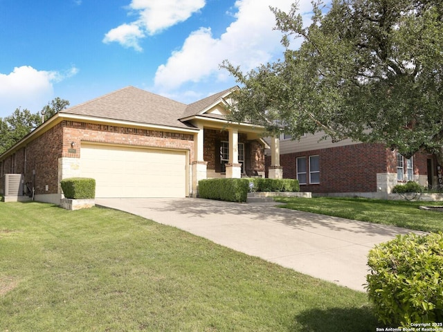 26940 Rustic Brk, San Antonio, TX 78261 - view of front of property featuring an attached garage, concrete driveway, a front yard, and brick siding
