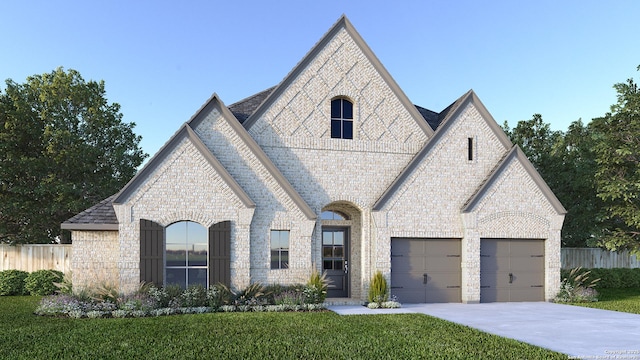 french provincial home with a garage, driveway, brick siding, and roof with shingles