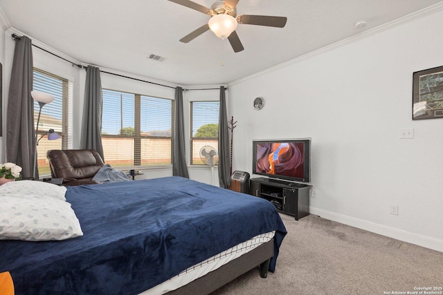 8515 Desert Cv, San Antonio, TX 78254 - carpeted bedroom with crown molding, baseboards, and a ceiling fan