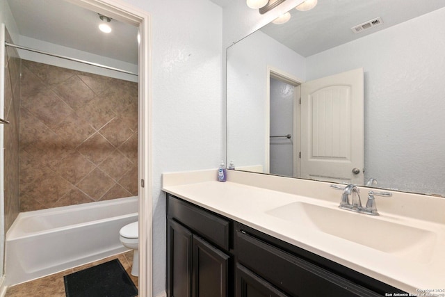 8515 Desert Cv, San Antonio, TX 78254 - bathroom with toilet, vanity, and shower / washtub combination
