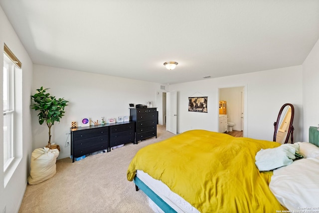 14407 Elkhorn Crst, San Antonio, TX 78253 - bedroom featuring light carpet and ensuite bathroom