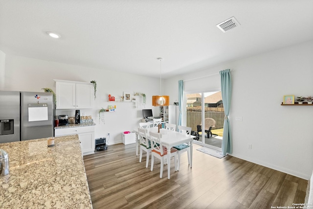 14407 Elkhorn Crst, San Antonio, TX 78253 - dining area featuring wood finished floors and baseboards
