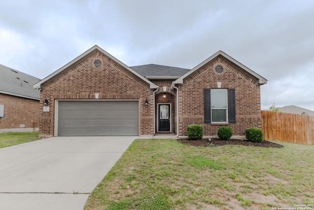 26323 Gibraltar, Boerne, TX 78015 - view of front facade featuring brick siding, an attached garage, and concrete driveway