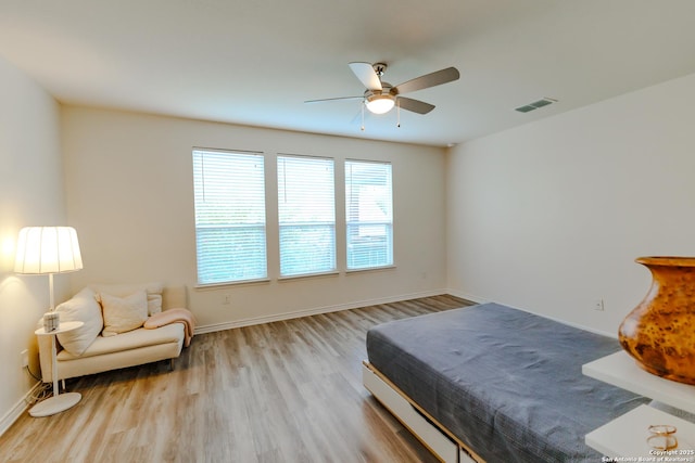 26323 Gibraltar, Boerne, TX 78015 - bedroom featuring wood finished floors, baseboards, and ceiling fan