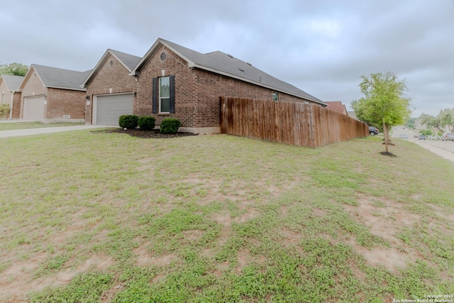 26323 Gibraltar, Boerne, TX 78015 - view of front of home with brick siding, an attached garage, and concrete driveway