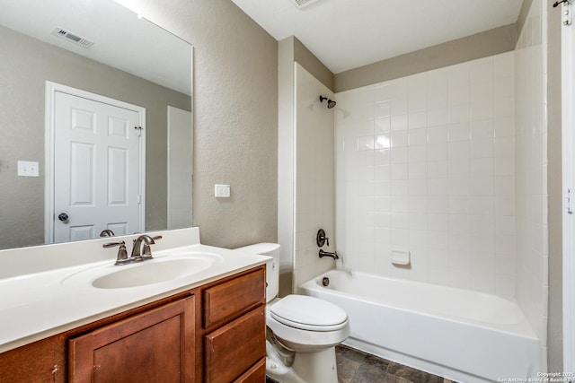 14802 Achilles Dr, San Antonio, TX 78245 - full bath featuring a textured wall, toilet, washtub / shower combination, and vanity