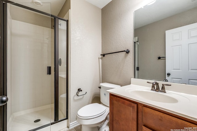 14802 Achilles Dr, San Antonio, TX 78245 - full bath featuring a textured wall, toilet, a shower stall, and vanity