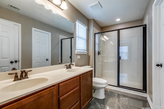 14802 Achilles Dr, San Antonio, TX 78245 - full bath with a stall shower, toilet, double vanity, and marble finish floors