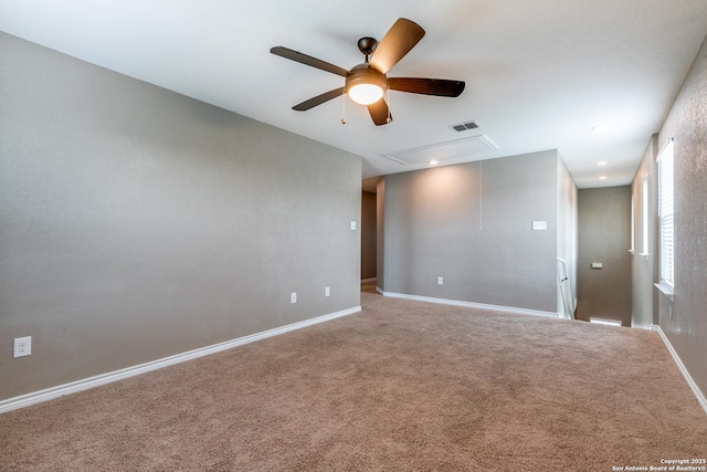 14802 Achilles Dr, San Antonio, TX 78245 - carpeted empty room featuring ceiling fan, attic access, and baseboards